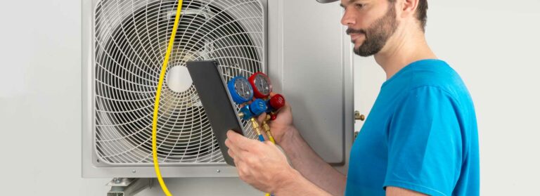 A contractor installing an eco-friendly cooling system